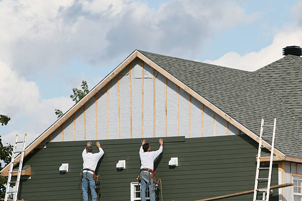 Professional Emergency Siding Repair technician working in Crittenden, KY